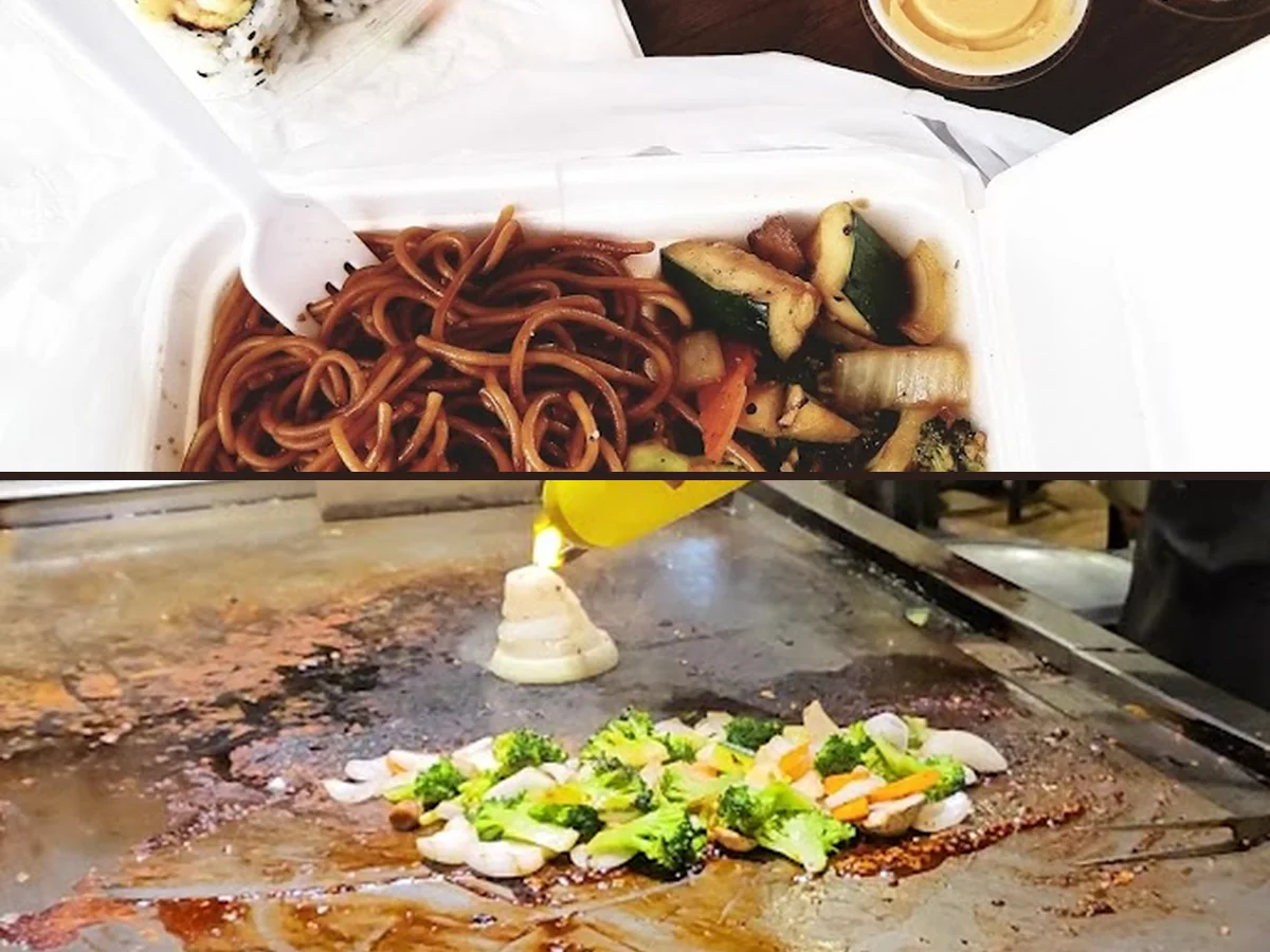Hibachi grill with chefs preparing dinner